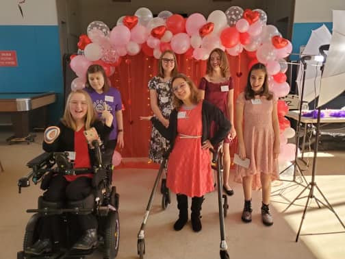 Friends dressed up at the Valentine's Dance
