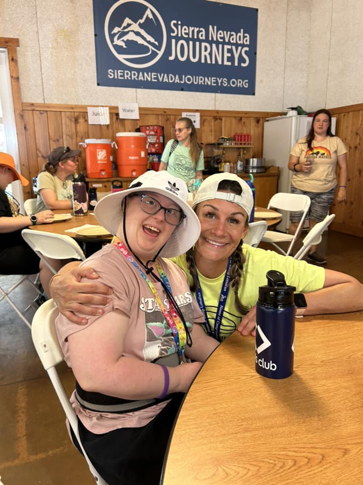 Staff member smiling with a participant