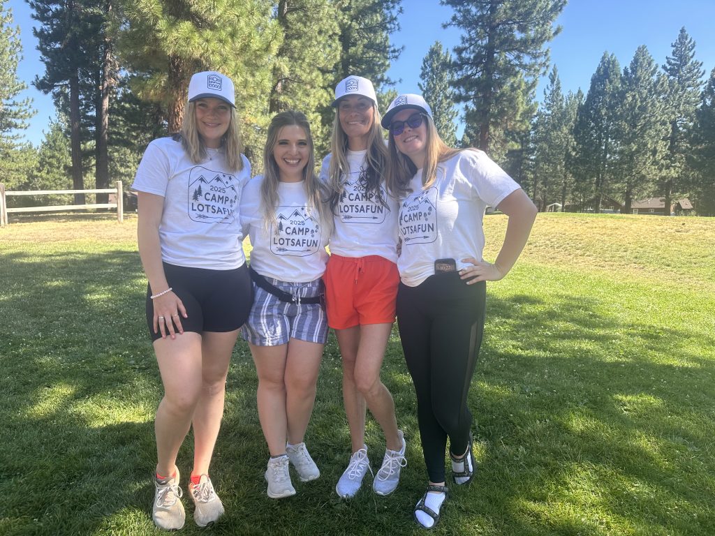 The Amplify Life staff team standing together outdoors