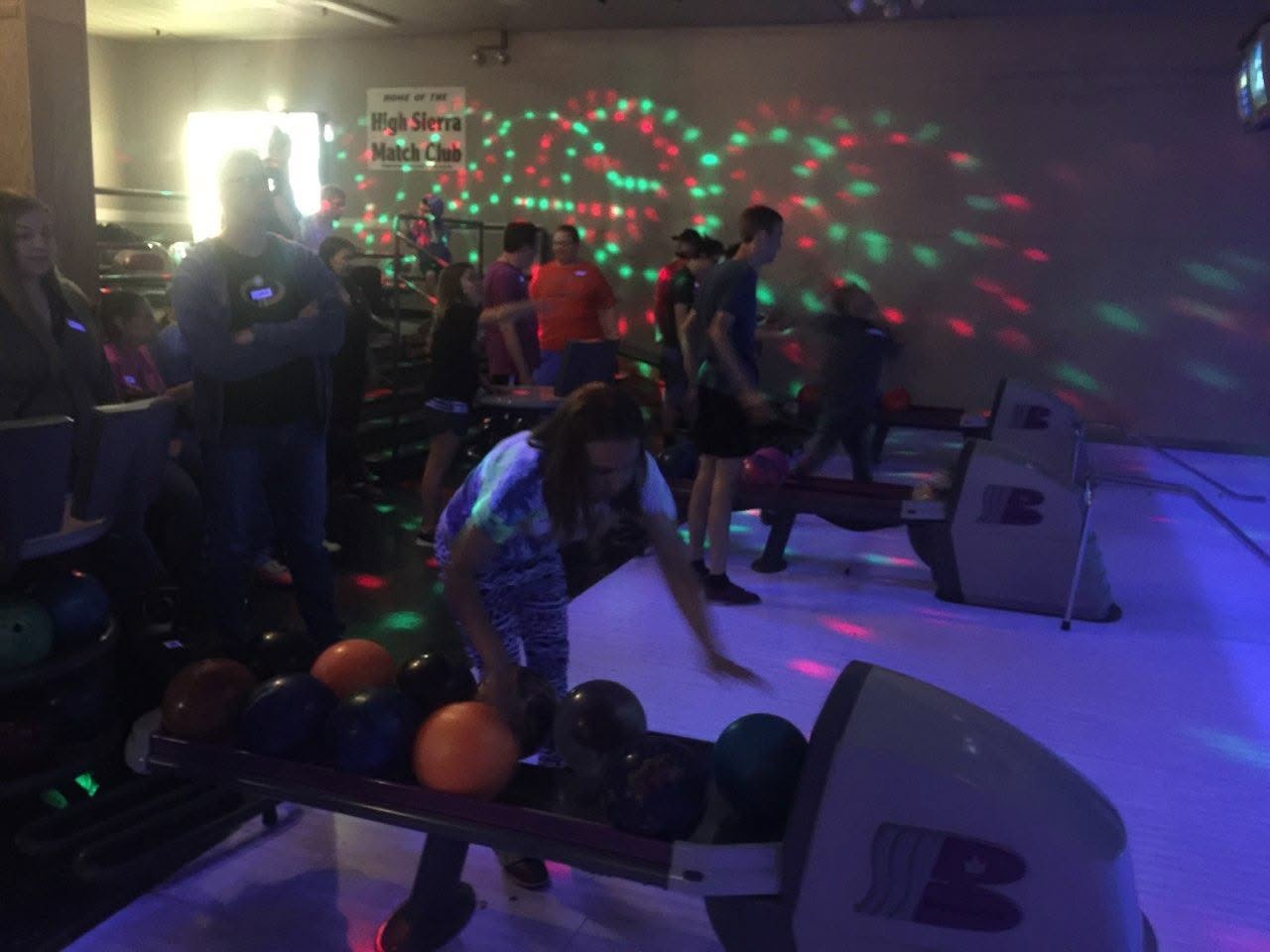 Cosmic bowling night with friends
