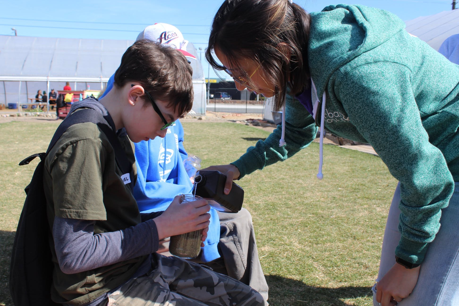 Participants meeting farm animals